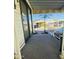 Covered patio with view of community and parking at 8700 E University Dr # 1049, Mesa, AZ 85207