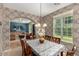 Bright dining room with table and chairs, view to living room at 875 S Brewer Dr, Gilbert, AZ 85296