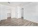 Light and airy bedroom with wood-look floors and ample closet space at 910 W Prior Ave, Coolidge, AZ 85128