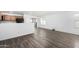 Dining area with laminate flooring and kitchen views at 910 W Prior Ave, Coolidge, AZ 85128