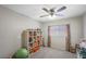 Charming bedroom with built in shelving and toys at 9176 N 82Nd Ln, Peoria, AZ 85345