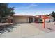 Single-story home with a two-car garage and landscaped front yard at 9176 N 82Nd Ln, Peoria, AZ 85345