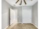 Bright bedroom with double door closet and tile flooring at 925 E Piedmont Rd, Phoenix, AZ 85042