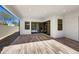 Covered patio with tile flooring and sliding glass doors at 925 E Piedmont Rd, Phoenix, AZ 85042