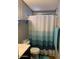 Bathroom with shower/tub combo and toilet at 9302 E Broadway Rd # 103, Mesa, AZ 85208