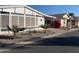 Street view of manufactured homes in a community setting at 9302 E Broadway Rd # 103, Mesa, AZ 85208