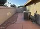 Small backyard with a concrete patio and gravel landscaping at 945 N Pasadena St # 113, Mesa, AZ 85201