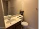 Updated bathroom with a single sink vanity and shower/tub combo at 945 N Pasadena St # 113, Mesa, AZ 85201