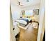 Spacious bedroom with queen bed and wood floors at 17234 N 28Th St, Phoenix, AZ 85032