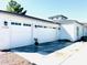 White three-car garage with modern design at 17234 N 28Th St, Phoenix, AZ 85032