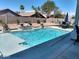 Spacious rectangular pool with waterfall feature at 17234 N 28Th St, Phoenix, AZ 85032