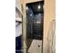 Modern shower with blue tile and penny round floor at 17234 N 28Th St, Phoenix, AZ 85032