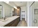 Main bathroom with double vanity, large mirror, and separate shower at 18231 E Coronado Cave Ct, Rio Verde, AZ 85263