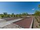 Well-maintained bocce ball courts with surrounding landscaping at 18231 E Coronado Cave Ct, Rio Verde, AZ 85263