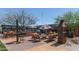 Outdoor clubhouse patio with seating and fire pit at 18231 E Coronado Cave Ct, Rio Verde, AZ 85263