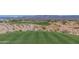 Golf course green with mountain backdrop and desert landscaping at 18231 E Coronado Cave Ct, Rio Verde, AZ 85263