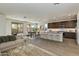Open concept kitchen with island and living area at 18231 E Coronado Cave Ct, Rio Verde, AZ 85263