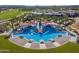 Resort-style pool with multiple lounge areas and shade structures at 18231 E Coronado Cave Ct, Rio Verde, AZ 85263