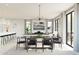 Modern dining room with marble top table and black chairs at 2036 N Woodburne Pl, Chandler, AZ 85224