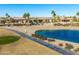 Property backs up to a lake and golf course with desirable views at 20621 N Canyon Whisper Dr, Surprise, AZ 85387