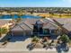 Luxury home with tile roof, large backyard, and a three car garage at 20621 N Canyon Whisper Dr, Surprise, AZ 85387