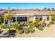 Relaxing backyard oasis featuring a covered patio and a water feature at 20621 N Canyon Whisper Dr, Surprise, AZ 85387