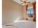 Bedroom with large window, offering scenic views at 20621 N Canyon Whisper Dr, Surprise, AZ 85387