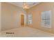 Bright bedroom with a closet and neutral carpeting at 20621 N Canyon Whisper Dr, Surprise, AZ 85387