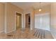 Bright foyer with tile floors and access to other rooms at 20621 N Canyon Whisper Dr, Surprise, AZ 85387