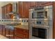 Kitchen with stainless steel appliances and granite counters at 20621 N Canyon Whisper Dr, Surprise, AZ 85387