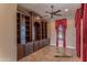Spacious office with built-in bookshelves and window seating at 20621 N Canyon Whisper Dr, Surprise, AZ 85387