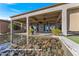 Relaxing patio view from over a water feature at 20621 N Canyon Whisper Dr, Surprise, AZ 85387