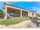 Covered patio with ceiling fans and a water feature at 20621 N Canyon Whisper Dr, Surprise, AZ 85387