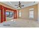 Primary bedroom with large windows and a golf course view at 20621 N Canyon Whisper Dr, Surprise, AZ 85387