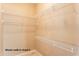 Walk-in closet with wire shelving and hanging rods at 20621 N Canyon Whisper Dr, Surprise, AZ 85387