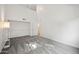 Spacious bedroom with grey carpet, vaulted ceiling, and a floor lamp at 2121 S Pennington Rd # 12, Mesa, AZ 85202