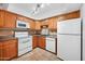Kitchen with wood cabinets and appliances at 2121 S Pennington Rd # 12, Mesa, AZ 85202