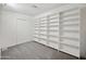 Large storage area with built in white shelving at 2121 S Pennington Rd # 12, Mesa, AZ 85202