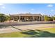 Back exterior view of the home showcasing patio and golf course at 25633 N Abajo Dr, Rio Verde, AZ 85263