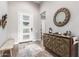 Bright and spacious entryway with modern console table and decor at 26203 W Maple Dr, Buckeye, AZ 85396