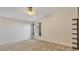 Well-lit carpeted bedroom features a modern ceiling fan and window at 2705 E Verbena Dr, Phoenix, AZ 85048