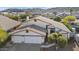 An aerial view of a lovely house with three garage bays at 2705 E Verbena Dr, Phoenix, AZ 85048