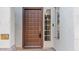 Close-up of the detailed front door with sidelight windows at 2705 E Verbena Dr, Phoenix, AZ 85048