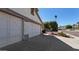Spacious three car garage with a concrete driveway at 2705 E Verbena Dr, Phoenix, AZ 85048