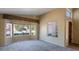 Open living room with large windows offering abundant natural light at 2705 E Verbena Dr, Phoenix, AZ 85048