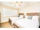 Bedroom with two twin beds and plantation shutters at 2806 N 82Nd St, Scottsdale, AZ 85257