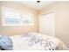 Bedroom with queen-size bed, window, and closet at 2806 N 82Nd St, Scottsdale, AZ 85257