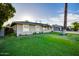 Neatly landscaped front yard with a palm tree at 2806 N 82Nd St, Scottsdale, AZ 85257