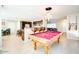 Open concept kitchen and game room with a pool table and bar seating at 2806 N 82Nd St, Scottsdale, AZ 85257