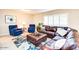 Living area with comfy armchairs, a large sofa, and an ottoman at 2806 N 82Nd St, Scottsdale, AZ 85257